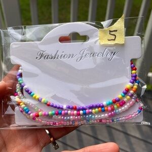 Set of 4 Stretchy anklets.  NWT.. handmade.
